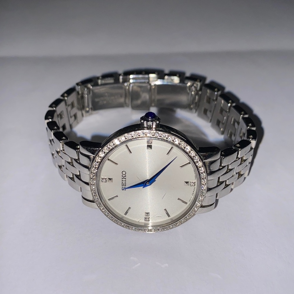 Seiko women’s watch with blue bezel